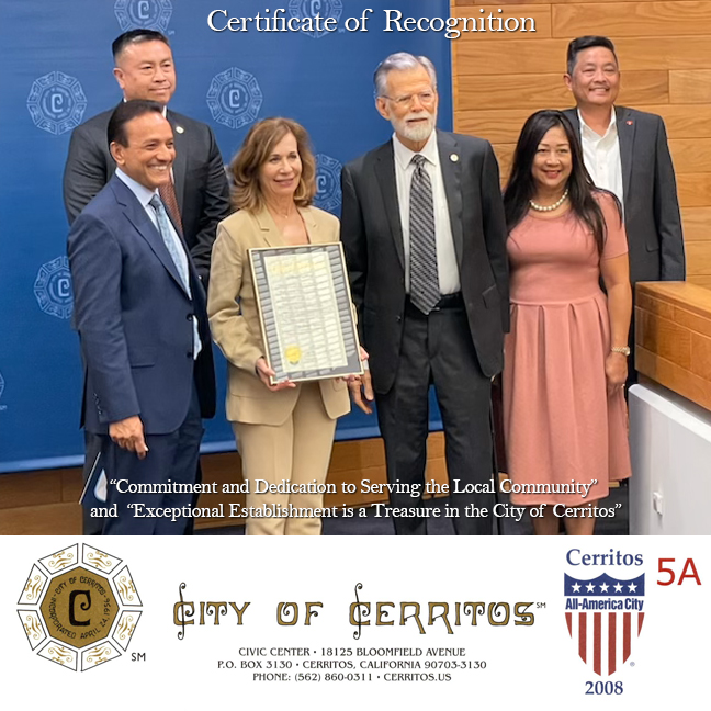 President and CEO of Insta Graphic Systems accepting certificate of recognition from the city of Cerritos